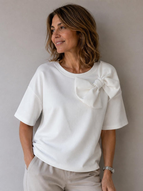 MAGLIA CON GRANDE FIOCCO